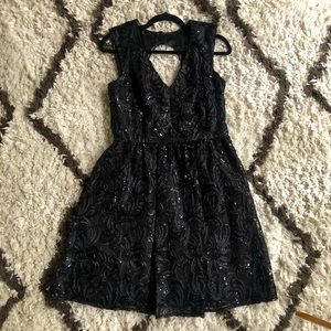 Sequined black party dress